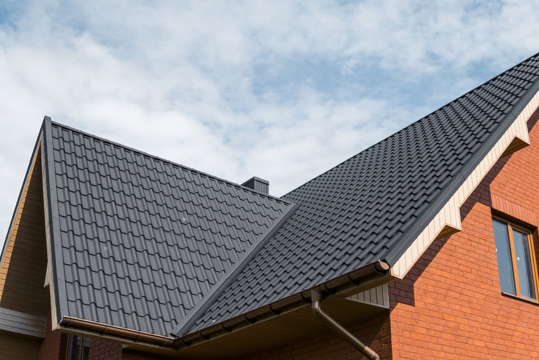 Dark roof on a brick home